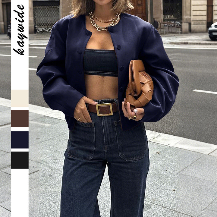 Dam oversized ulljacka med snap knäppning, boxy silhuett, och påsydda fickor