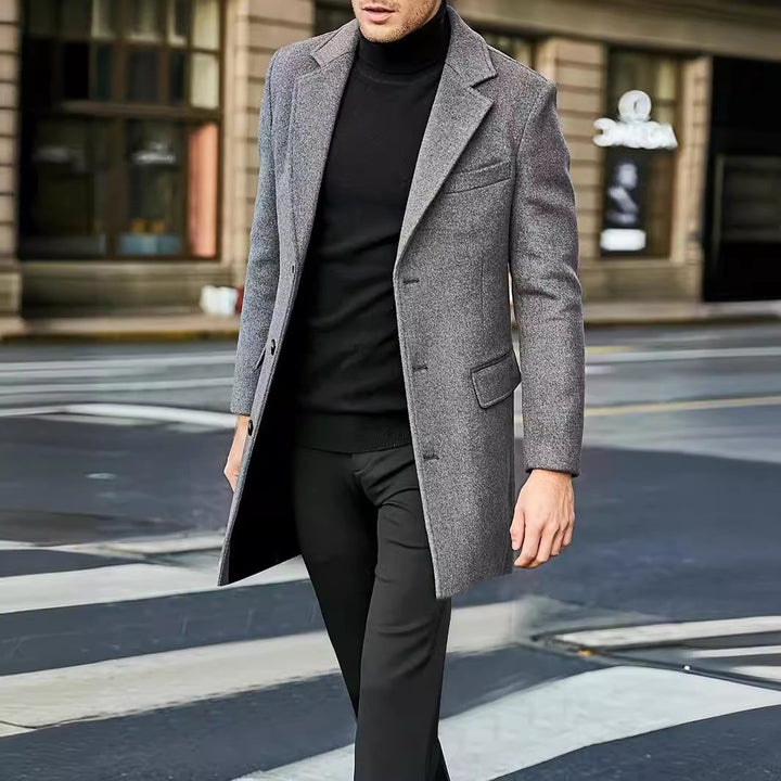 Herr modern lång kappa tillverkad av ullblandning med Smal Lapels, fickor med lock och slim passform