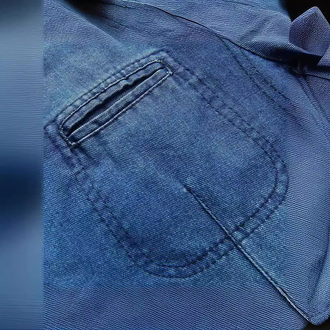 Herr denim blazer i en lös passform med slagkrage och utanpåfickor
