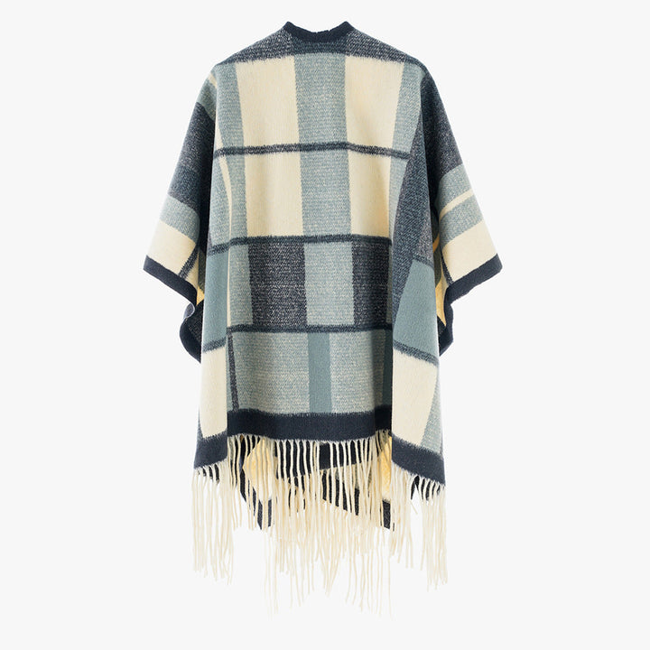 Dam capeponcho i oversized rectangular skärning med rutig weave structure och fringes.