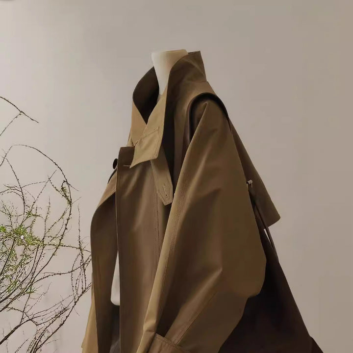 Dam trench-inspired kort jacka med oversize silhuett, stand krage, och dold dragkedja