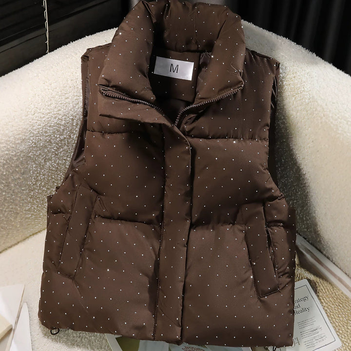 Dam non-quiltad sleeveless thermal väst med high standing krage, concealed dragkedja placket, och fine dot tryck