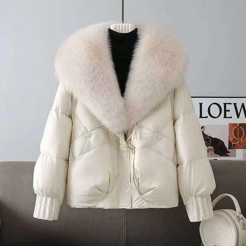 Dam kort vadderad jacka med luxurious faux fur krage och skräddad dragsko