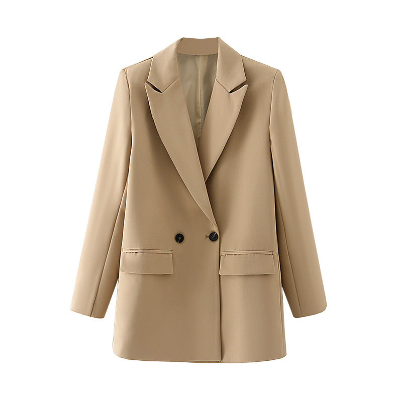 Dam figursydd lång blazer i oversized look med lapel krage och påsydda fickor