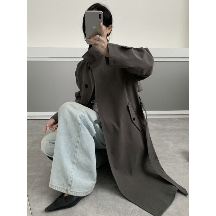 Dam Mid-length trenchcoat med hög ståkrage, knytband och avslappnad oversize silhuett