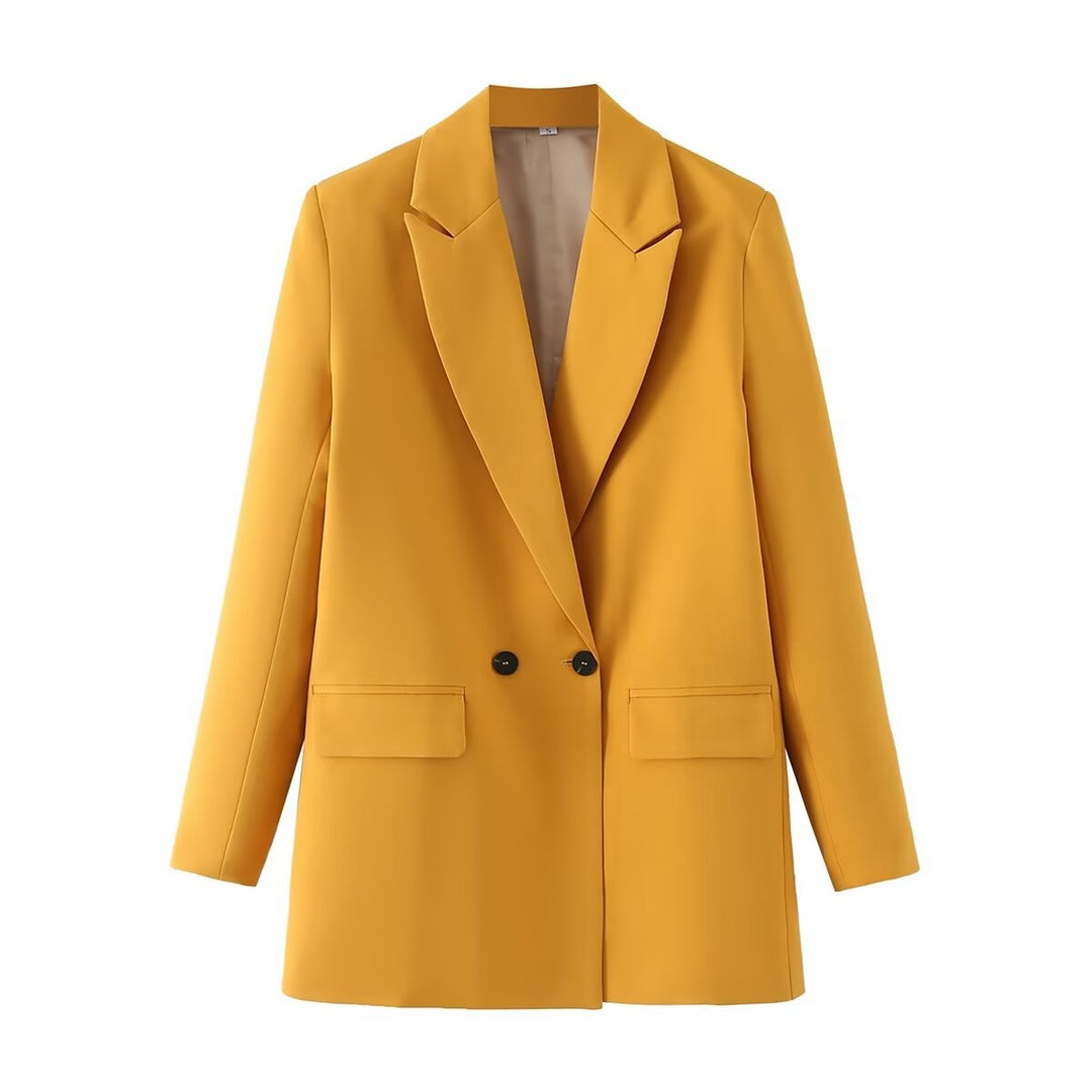 Dam figursydd lång blazer i oversized look med lapel krage och påsydda fickor