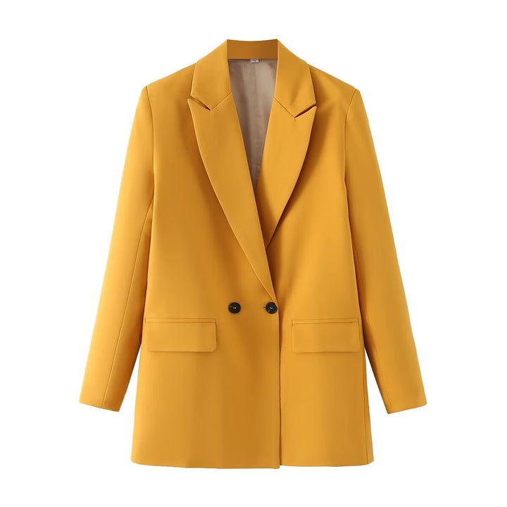 Dam figursydd lång blazer i oversized look med lapel krage och påsydda fickor