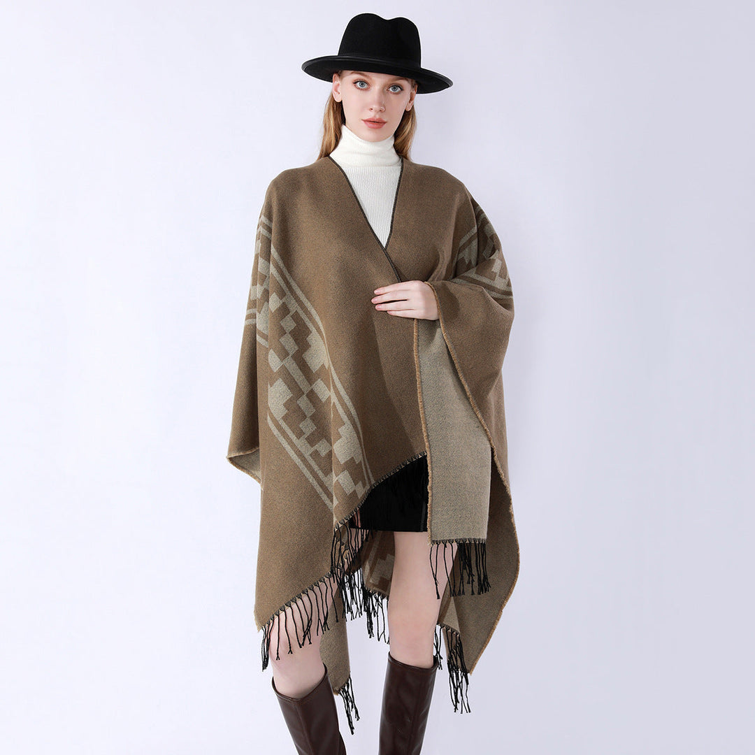 Dam Oversize Cape med geometric Jacquard, fransfåll och reversible function