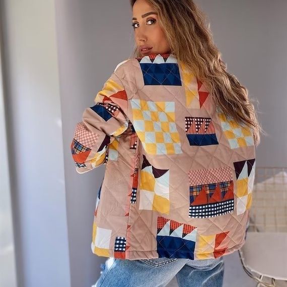 Dam quiltad patchwork jacka med ståkrage och flap fickor