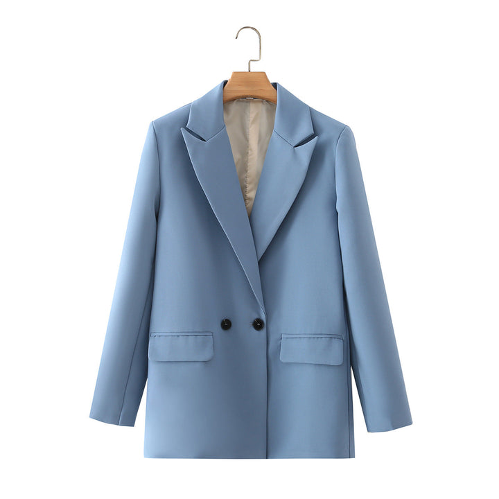 Dam figursydd lång blazer i oversized look med lapel krage och påsydda fickor