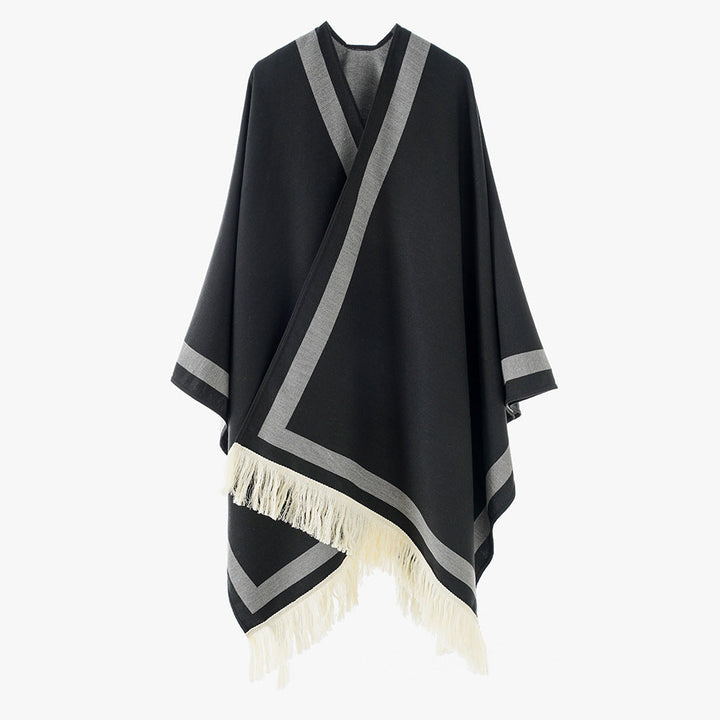 Dam quiltad oversized capeponcho i kimono skärning med kontrast kant och fransfåll