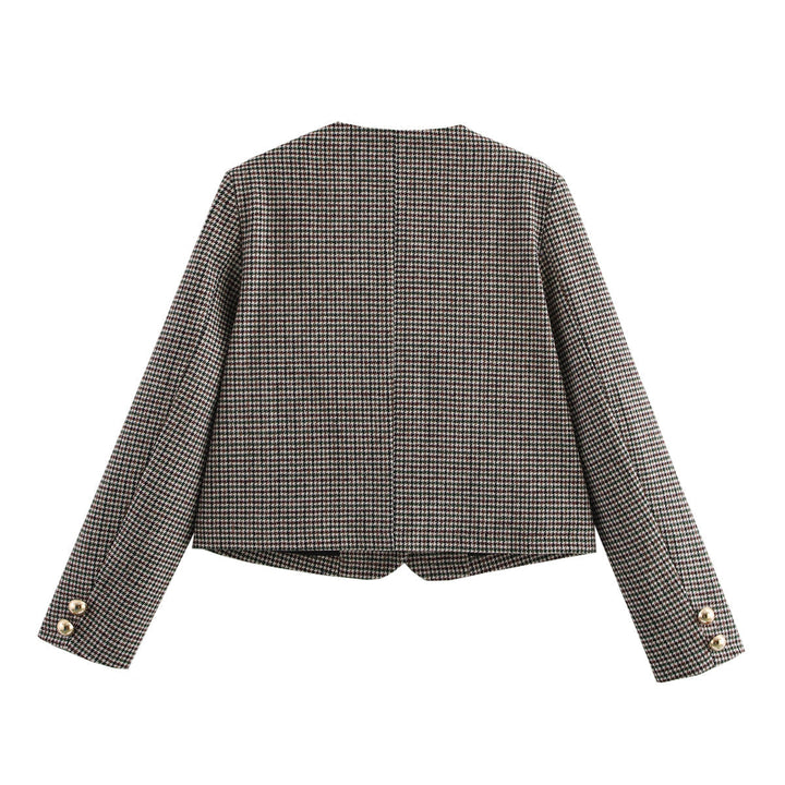 Dam figursydd kort jacka i houndstooth mönster med golden decorative knappar och angled fickor