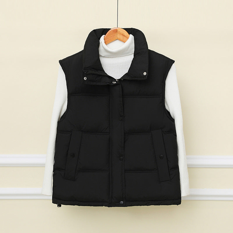 Dam non-vadderad sleeveless thermo quiltad väst med extra high standing krage och concealed snap knäppning
