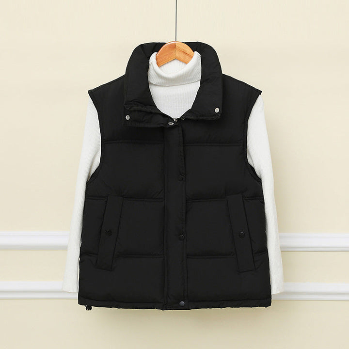 Dam non-vadderad sleeveless thermo quiltad väst med extra high standing krage och concealed snap knäppning