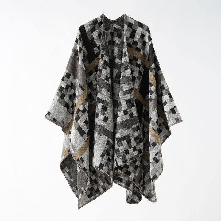 Dam Kastiger Web poncho med graphic jacquard och fringe edge