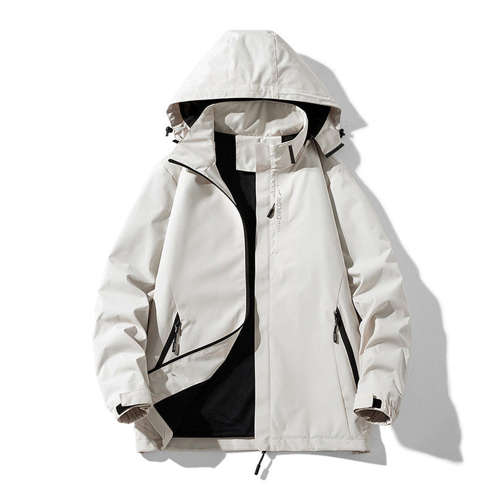 Dam vattentät outdoorjacka med andningsbar mesh foder, fickor med dragkedja, och Velcro cuffs