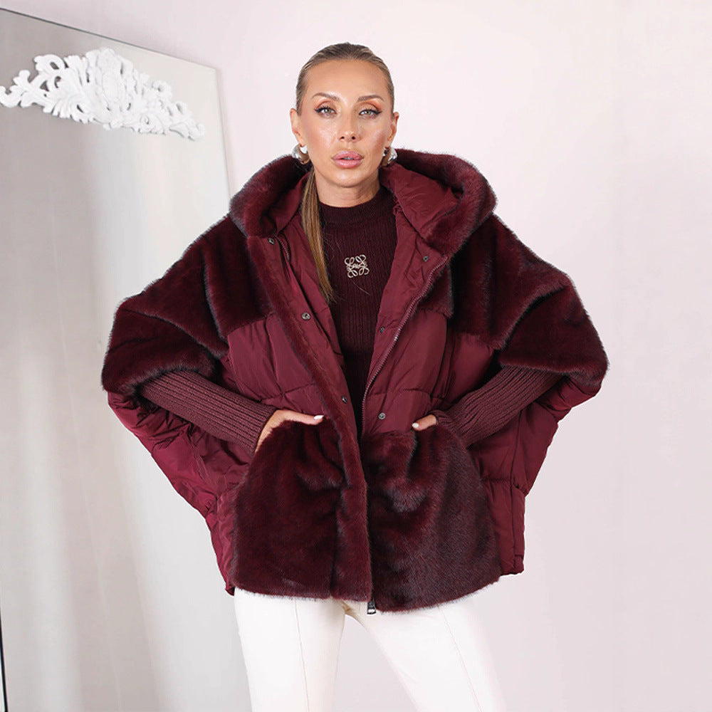 Dam kort kviltad med huva jacka med voluminous faux fur trim och oversize silhuett