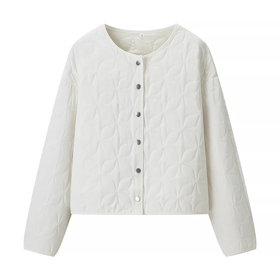 Dam quiltad boxy övergångsjacka med floral quiltad texture, lightly vadderad innerfoder och press stud placket