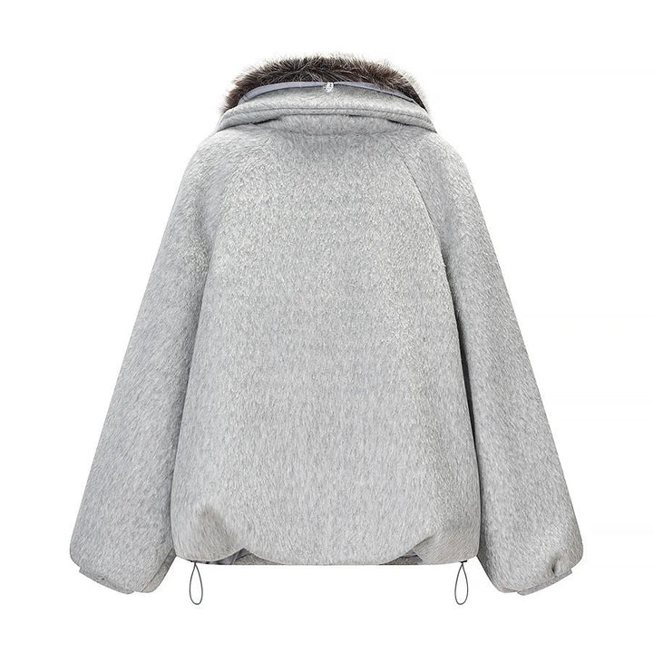 Dam kort oversized jacka i ullblandning med voluminous fuskpälskrage och patch flap fickor
