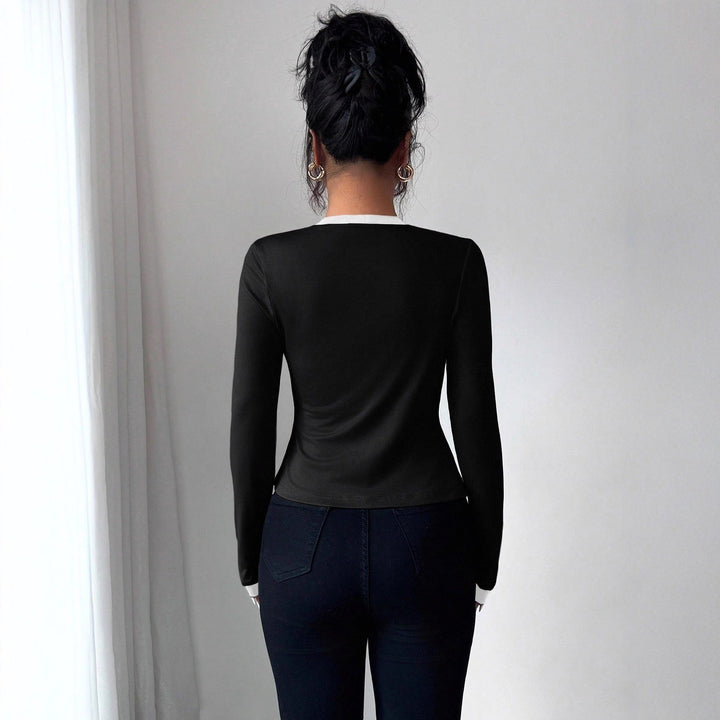 Dam figurnära jacka med integrerad bustier insats och kontrast kant