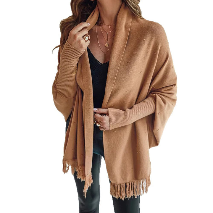 Dam Fringe poncho kofta med decorative midjebälte och ribbstickade muddar