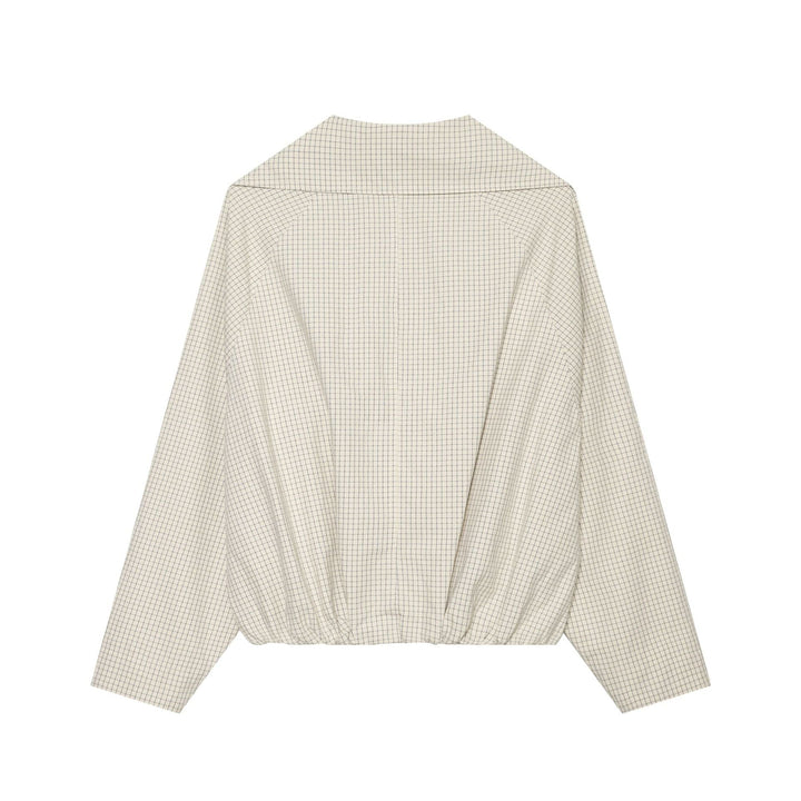 Dam kort skärning double-breasted trenchcoat med oversized sjalkrage och elastisk fåll