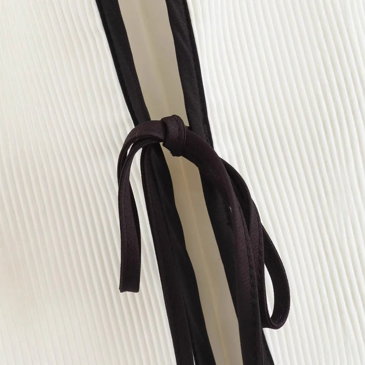Dam light boxy jacka med kontrast piping, ties och påsydda fickor