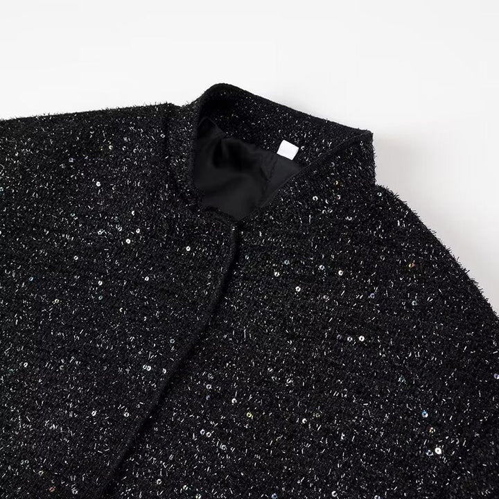 Dam sparkling kort boxy jacka med elastisk fåll och subtle ståkrage