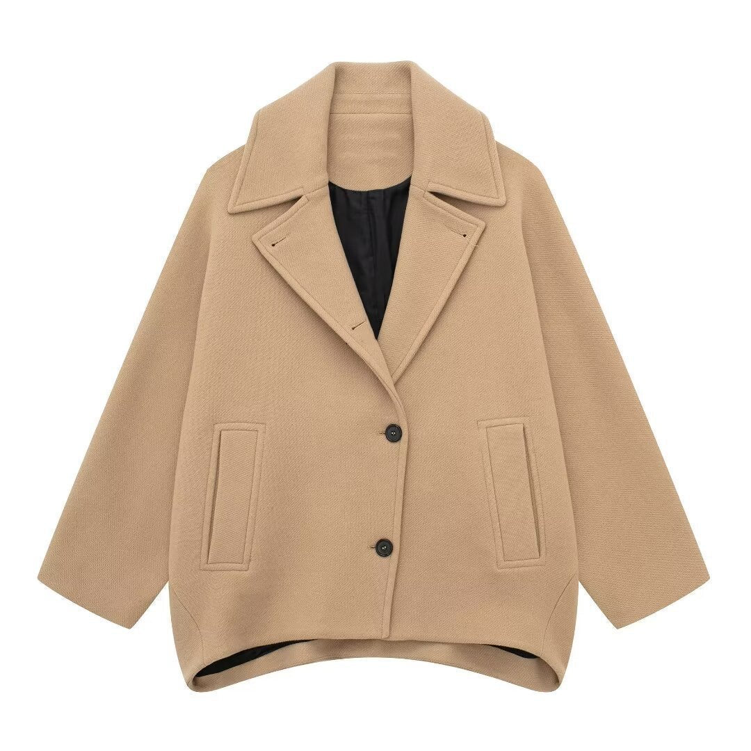 Dam kort skuren oversize ullblandning caban med vid lapels och boxy silhuett