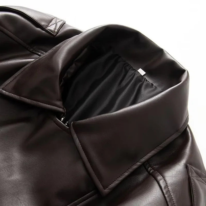 Dam oversized konstläderjacka med stor sjalkrage, påsydda fickor och elastic waistband