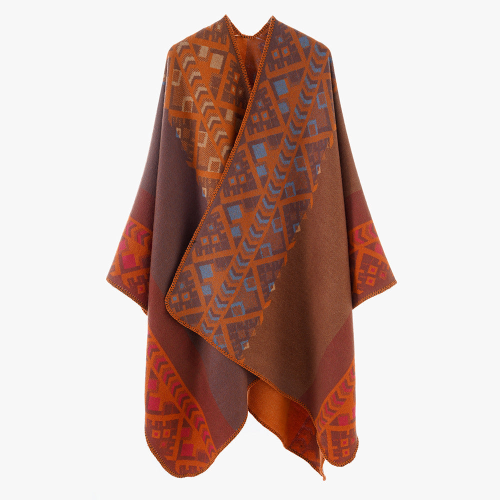 Dam capeponcho i woven ethnic jacquard tillverkad av ullblandning med zigzag fåll edge