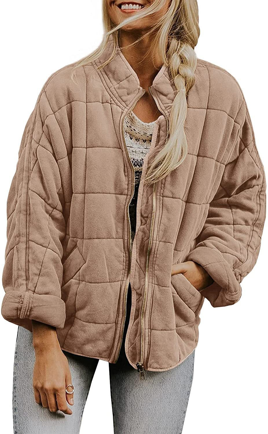 Dam oversize kviltad jacka med dragkedja och sidofickor