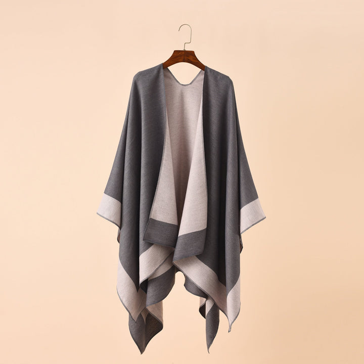 Dam Reversible poncho-Cape tillverkad av Cashmere Blend med oversized skärning