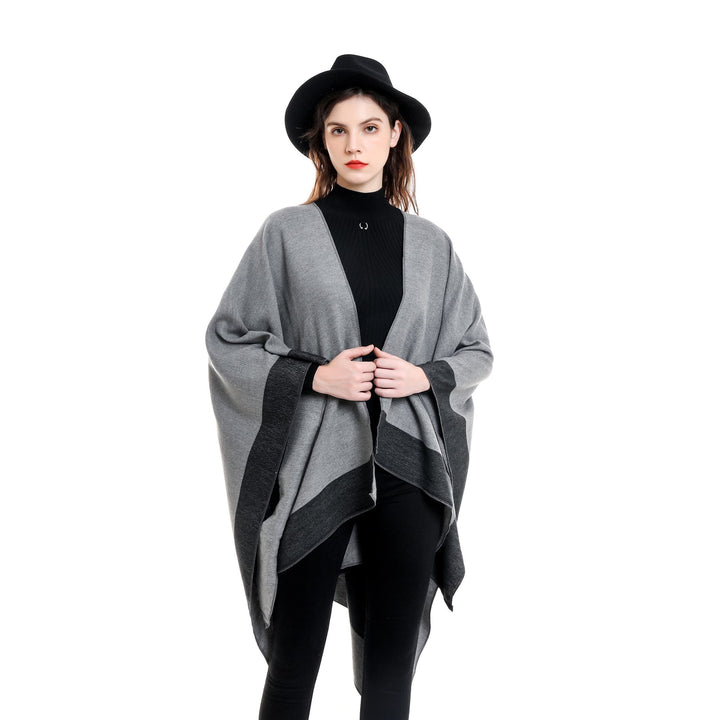 Dam Reversible poncho-Cape tillverkad av Cashmere Blend med oversized skärning