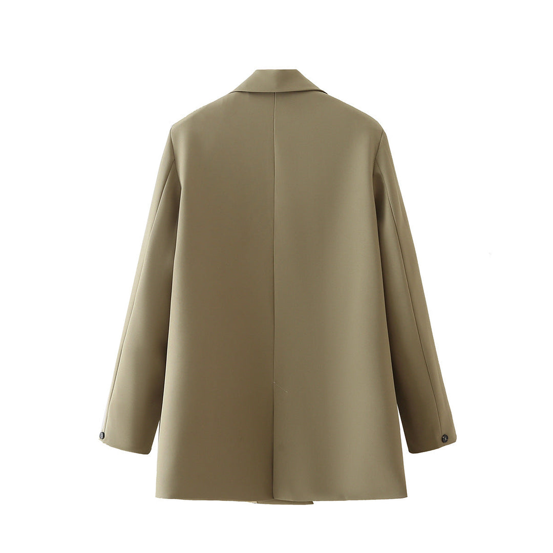 Dam figursydd lång blazer i oversized look med lapel krage och påsydda fickor