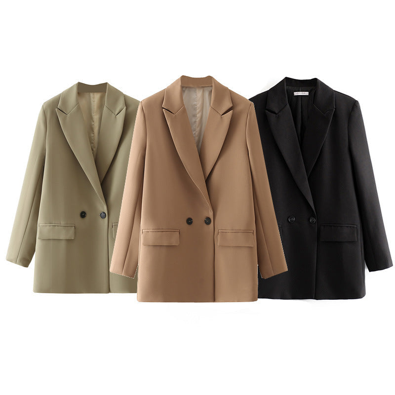 Dam figursydd lång blazer i oversized look med lapel krage och påsydda fickor