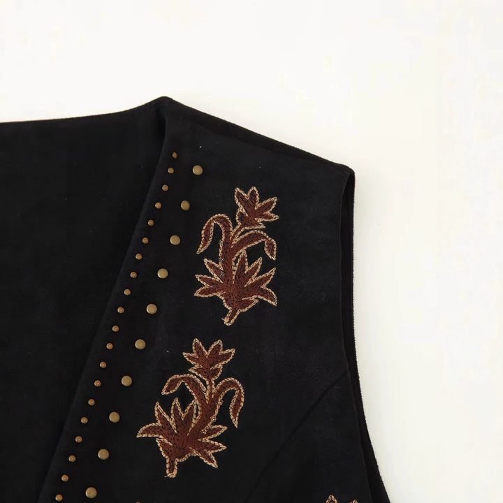 Dam embroidered figursydd väst med floral embroidery, metal studs, och tie band