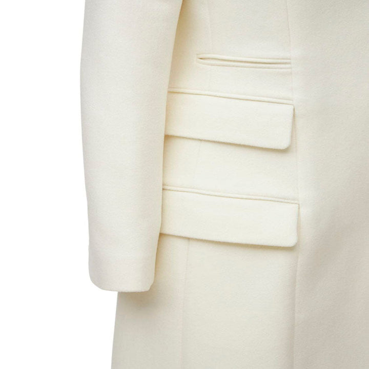 Dam lång kappa in a minimalistisk blazer stil med dold knappslå och triple flap ficka
