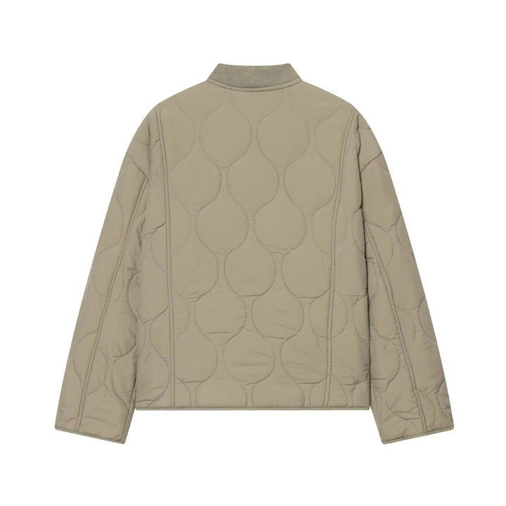 Dam non-vadderad quiltad jacka med boxy silhuett, ribbed ståkrage och patch flap fickor