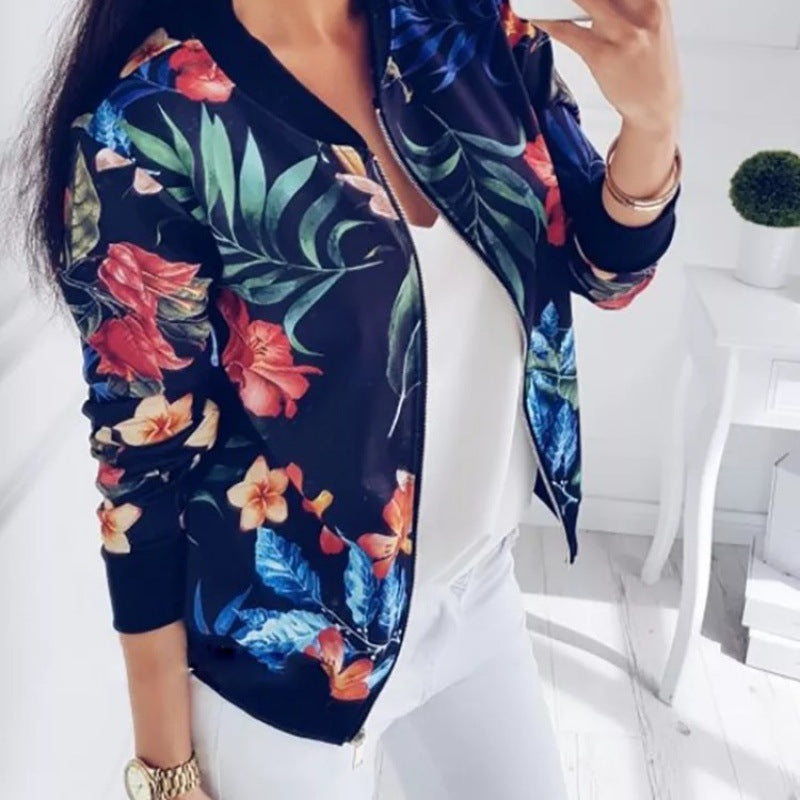 Dam blousonjacka med floral alla-över tryck, dragkedja och ribbstickade muddar