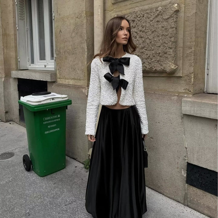 Dam sparkling cropped bolero jacka med sequin kant och decorative satin bows