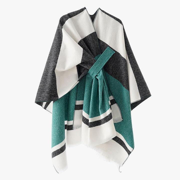 Dam oversized capeponcho tillverkad av ullblandning med tie loop och randig border