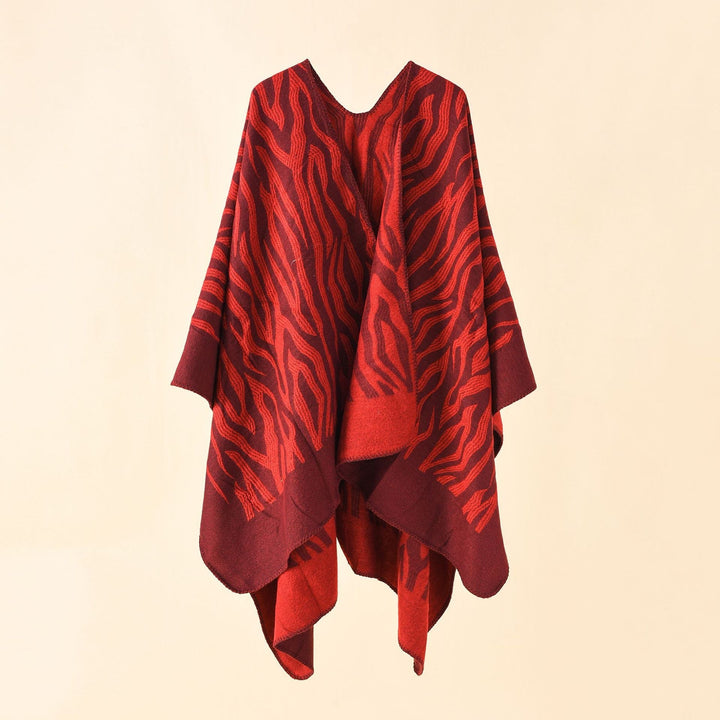 Dam Zebra Jacquard poncho Cape i oversized kimono passform tillverkad av mjuk fine stickad