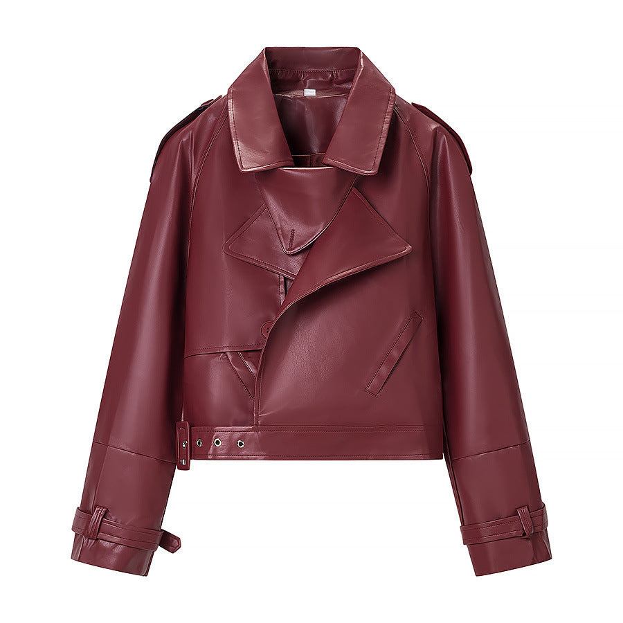 Dam kort skärning bikerjacka in läderlook med asymmetrical lapel och midjebälte