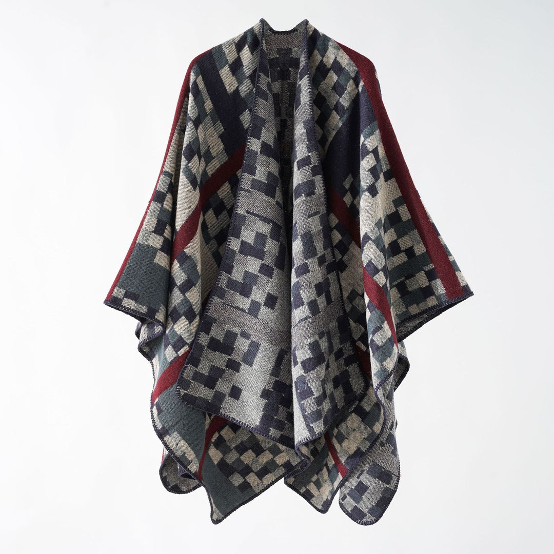 Dam Kastiger Web poncho med graphic jacquard och fringe edge