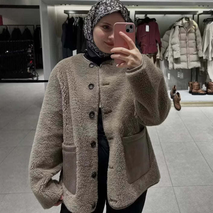 Dam fleecejacka med teddy foder och påsydda fickor