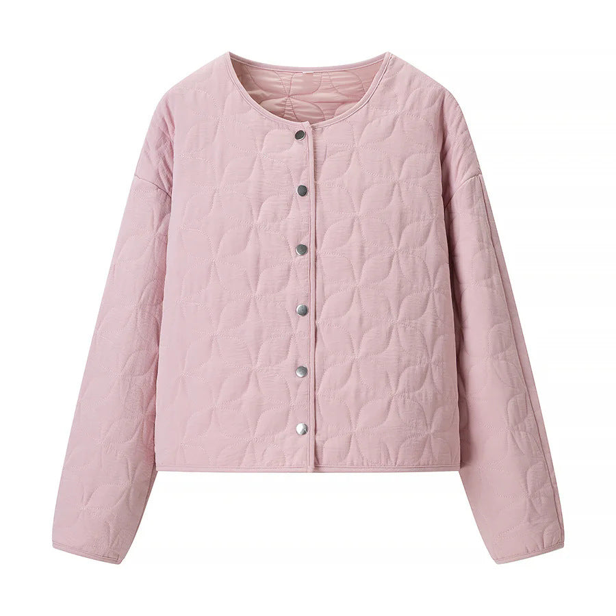 Dam quiltad boxy övergångsjacka med floral quiltad texture, lightly vadderad innerfoder och press stud placket