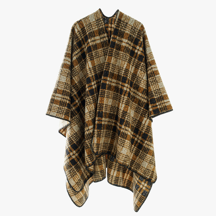 Dam Oversize Check Cape tillverkad av mjuk ullblandning med kontrasterande overlock seam