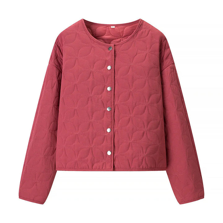 Dam quiltad boxy övergångsjacka med floral quiltad texture, lightly vadderad innerfoder och press stud placket