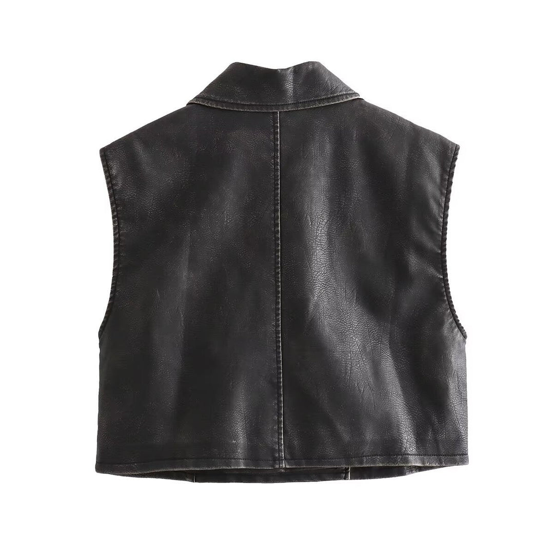 Dam kort sleeveless biker väst tillverkad av konstläder med bred lapels och asymmetric dragkedja
